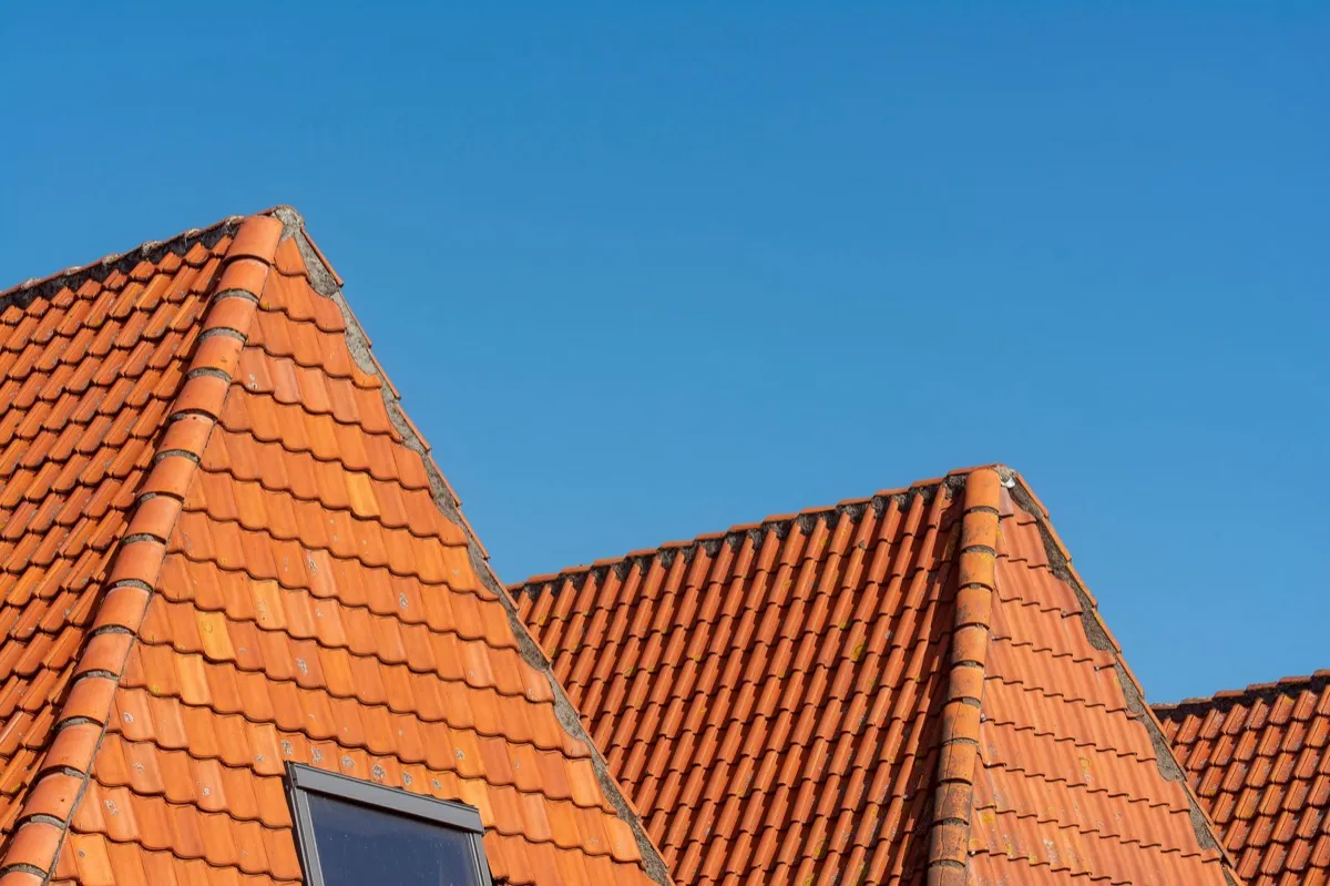 Clay barrel tile rooflines on homes in Garden Grove, CA